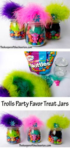 troll party treat jars filled with candy and colorful feathers for the kids to play in