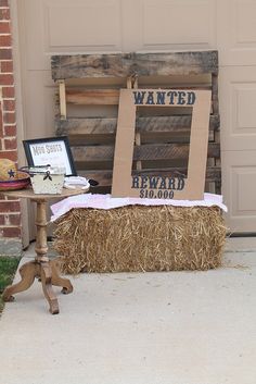 a hay bale sitting in front of a door