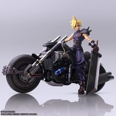 an action figure is posed on a motorcycle