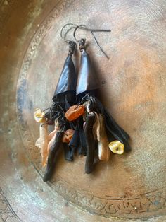 WITCH EARRINGS / Copper Rustic Earrings / Handmade / One of A Kind / Copper Jewelry I designed with genuine black leather and Copper The measured is from top to the end 9cm I have oxidized with liver of sulphure. I will send you nice gift box ,eco-friendly packet and Registered AirMail. Many thanks for visit my store.🧚��🧚 Artisan Dangle Earrings For Party, Handmade Witchy Earrings For Gift, Handmade Vintage Halloween Earrings, Vintage Handmade Halloween Earrings, Handmade Bohemian Earrings For Halloween, Handmade Witchy Dangle Earrings, Bohemian Earrings For Halloween Gift, Bohemian Halloween Earrings As Gift, Bohemian Halloween Gift Earrings