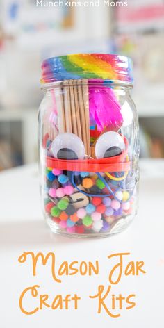 mason jar craft kits for kids to make with colorful beads and paper straws in a glass jar