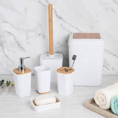 bathroom accessories including soap dispenser, toothbrush holder, and other items