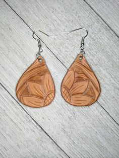 Hey, I found this really awesome Etsy listing at https://www.etsy.com/listing/719911879/teardrop-sunflower-tooled-leather Handmade Teardrop Faux Leather Earrings, Leather Teardrop Earrings For Everyday Use, Handmade Brown Faux Leather Earrings, Everyday Brown Teardrop Jewelry, Hand Tooled Brown Earrings For Everyday Wear, Brown Dangle Flower Earrings, Brown Hand Tooled Everyday Earrings, Everyday Leather Teardrop Earrings, Brown Flower Drop Earrings