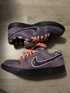 Elevate your sneaker game with these Nike Concepts x Dunk SB Low Purple Lobster 2018 sneakers. The low-top shoe shaft style, combined with the athletic type and boxing performance/activity, make these sneakers a versatile choice for any occasion. The purple color adds a pop of style to any outfit, while the Nike Dunk product line ensures quality and durability. These sneakers are designed for men and come in a US shoe size 9.5. The style code is BV1310-555-SB, and the model is Nike Dunk SB. These sneakers are perfect for those who love sneakers and want to add a unique piece to their collection. Purple Lobster, Sneaker Games, Nike Dunk, The Purple, Nike Dunks, Top Shoes, Very Rare, Purple Color, Boxing