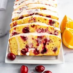 slices of cranberry orange bread on a white plate