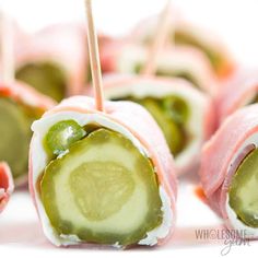 cucumber wrapped in bacon and cheese on a stick