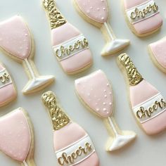 pink and gold decorated cookies with champagne glasses