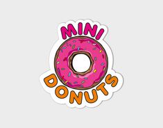 a pink donut with sprinkles that says,'mini donuts '