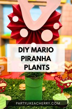 some cupcakes that are sitting in the grass with paper decorations around them and text overlay saying diy mario piranha plants