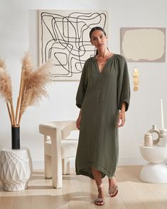 One of Oprah's Favorite things, in a limited edition color, this cozy, 100% cotton fabric, is a year around staple. The double gauze fabric feels like you are wearing your favorite pajamas, and bonus, it's not the least bit sheer! To make it even more irresistible, we added pockets and a flattering asymmetric hem. The raw edge details add a bit of deconstructionist chic. Once it's on, we dare you to take it off. Cotton Maxi Dress For Fall Beach, Cotton Maxi Dress For Fall Beach Outings, Cotton Maxi Dress For Beach In Fall, Cotton Tunic With Relaxed Fit For Daywear, Relaxed Fit Cotton Tunic For Daywear, Fall Vacation Cotton Maxi Dress, Cotton Maxi Dress For Fall Vacation, V-neck Tunic For Beach In Fall, Fall Beach Tunic With V-neck