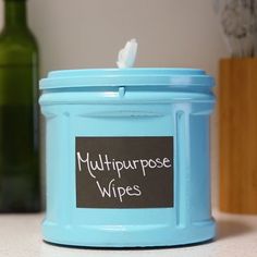 a blue container with a label that says multipurpose wipes on the side