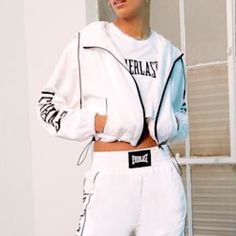 Nwt Forever 21 Everlast Cropped Windbreaker Full Zip Size 0x New With Tags White With Black Lettering Contrast Trim, Long Sleeves, Everlast Text, Elasticized Trim, Zip Front, Hooded, Slant Front Pockets, Cropped Hem, Side Toggle Closures Right And Left Hem 100% Polyester Machine Wash Cold White Oversized Sporty Windbreaker, Sporty White Oversized Windbreaker, Forever 21 Sporty Long Sleeve Outerwear, Forever 21 White Trendy Outerwear, Trendy White Outerwear From Forever 21, Sporty Spring Outerwear From Forever 21, White Long Sleeve Outerwear By Forever 21, Cropped Windbreaker, Forever 21 Jacket