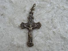 Religious antique silvered crucifix pendant cross pectoral cross Jesus Christ, rosary necklace cross. Measures: 0,53 x 0,89 inches ( 1,36 x 2,27 cm ) I bought the cross on a brocante ( fleamarket ) in France. I deliver all over the world. Registered shipping is possible. If you haven't Paypal, you can pay by bank transfer. I have a lot of these crosses. If you have a question feel free to ask. Please take also a look at my other items for sale. Antique Crucifix Rosary Gift, Antique Crucifix Rosary As Gift, Antique Cross Rosary As Gift, Pectoral Cross, Catholic Crucifix, Cross Jesus, Necklace Cross, Rosary Necklace, Jesus On The Cross