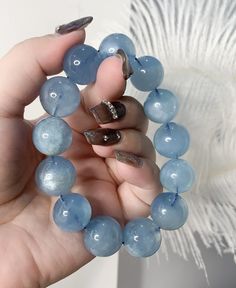 Material:Aquamarine beaded Beads Size 15mm Hand circumference 15+mm quantity: one strand  6mm approx 29 pcs one strands 7mm approx25 pcs one strands 8mm approx 22 pcs one strands 9mm approx 21pcs one strands 10mm approx 19 pcs one strands 11mm approx 18pcs one strands 12mm approx 16 pcs one strands 13mm approx 16 pcs one strands 14mm approx 15 pcs one strands 15mm approx 14pcs one strands 16mm approx 14 pcs one strands 17mm approx 13pcs one strands 18mm approx 13pcs one strands 19mm approx 12pcs one strands 20mm approx 12pcs one strands PLEASE NOTE: 1.Due to lighting effects, monitor's brightness/contrast settings etc, there could be some slight differences in the color tone of the pictures and the actual item. 2.Each piece of natural crystal is unique, the imperfections add natural charac Aquamarine Beaded Bracelet, Aquamarine Bracelet Beads, Beaded Beads, Aquamarine Beads, Bracelets Handmade Beaded, Natural Aquamarine, Bracelet Handmade, Colour Tone, Natural Crystals