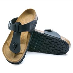 Birkenstock Medina Thong Sandal Black Nib. Brand New In Box! Regular Width The Birkenstock Medina Is A Variation On The Classic Gizeh Sandal. The Thong Sandal Has Two Straps That Merge With One Another To Give It A Sturdy Look And Function. The Upper Is Made Of The Skin-Friendly, Hard-Wearing Synthetic Material Birko-Flor In A Sophisticated Nubuck Look Which Boasts A Texture And Colour That Could Almost Be Mistaken For Real Leather. Anatomically Shaped Cork-Latex Footbed Upper: Birko-Flor Nubuck Black T-strap Sandals With Leather Footbed, Black T-strap Sandals With Rubber Sole For Beach, Black T-strap Flip Flops With Cushioned Footbed, Black T-strap Flip Flops With Removable Insole, Black T-strap Sandals With Cushioned Footbed, Black T-strap Sandals With Textured Footbed, Casual Black Toe Post T-strap Sandals, Black Adjustable T-strap Sandals With Leather Footbed, Adjustable Black T-strap Sandals With Leather Footbed