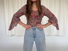 "Sheer y2k era floral print bell sleeve blouse in excellent condition with no noted flaws. Labled size small. Seen here on a women's modern size small. 18\" pit to pit 23\" long size small" Blouse Y2k, Clothing Y2k, Y2k Era, Flared Sleeves Top, Vintage Flare, Shirt Y2k, Bell Sleeve Blouse, Flared Sleeves, Bell Sleeve