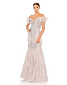 Mac Duggal Sheer Hand-embellished Lace Overlay; 100% polyester lining Partially lined through bodice; fully lined through skirt Sweetheart neckline Mesh bust inset Feathered off-the-shoulder sleeves Floral appliqué accented by silver heat-set crystal embellishments Fitted through mid-skirt; showcasing a trumpet silhouette Bust cups Concealed back zipper Approx. 62.5" from top of shoulder to bottom hem Available in Lilac and Olive Style #20246 Olive Style, Prom Long, Mid Skirt, Tulle Evening Dress, Trumpet Gown, Sleeveless Gown, Mac Duggal, Mermaid Gown, Metallic Dress