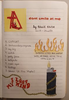 an open notebook with writing on it and images of fire extinguishers