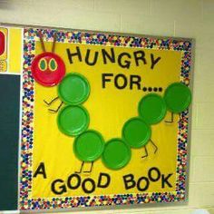 the very hungry caterpillar bulletin board is decorated with paper plates and magnets