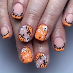 halloween nail art with pumpkins, bats and jack - o'- lanternes