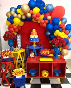 a birthday party with balloons and decorations