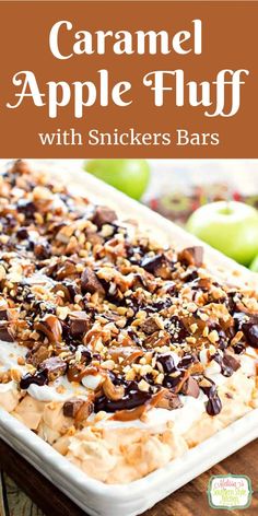 caramel apple fluff with snickkers bars in a white dish on a wooden table