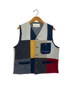 Sku 0137 *BUY 2PCS ABOVE CAN GET BEST OFFER *OFFER ARE WELCOME! Rare‼️ Vintage Pia Sport Wool Vest Patchwork Design Multicolor Made in Japan * Tag Pia Sport * Size S MEASUREMENT : IN CM CHEST:  Measure straight across from armpit to armpit = 53' LENGTH: from base of collar/neck to bottom hem = 59' SHOULDERS: straight across highest point of shoulders = 39' SLEEVE LENGTH: Measure from top of the shoulder seam to bottom edge of sleeve = -' HEM: Measure straight across bottom hem = 52' Condition : Casual Multicolor Patchwork Vest, Mens Formal Vest, Patchwork Vest, Formal Vest, Patchwork Fashion, Wool Vest, Mens Formal, Vest Fashion, Vest Outfits