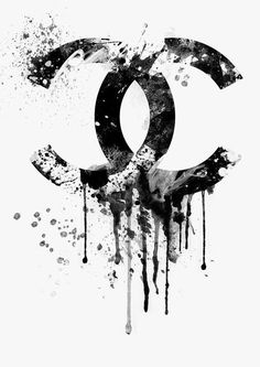 the chanel logo is painted in black and white with paint splatters on it