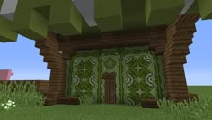 the entrance to a house made out of wood and green tilework in minecraft