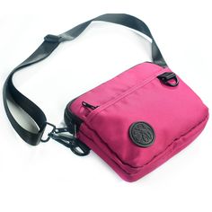 A magenta rose pink with a silver gray liner, Versatile, fun and cute this lightweight bag features 3 functions in 1. Wear it as a hip pack, crossbody bag or wristlet. Stay hands free and carefree with plenty of room for your wallet, keys, phone and other small everyday necessities. Our strap system is intended to create versatility of use and fit a variety of body types. Includes:-4 zippered compartments -52” strap that fits waist/hip size 39”-61.5” or extend fully for crossbody wear -31” strap Magenta Rose, Hip Pack, Lightweight Bag, 3 In 1, Rose Pink, Hands Free, Body Types, Pink Roses, Patch Logo