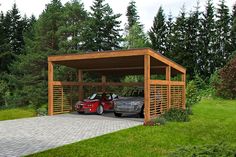 two cars are parked in a carport