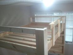 there is a bunk bed made out of wood