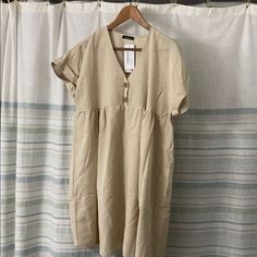 Reposhing This Item I Just Purchased Because It Didn’t Fit Me Right In The Chest Area. It’s Not A Full Empire Waist Top And Cuts Off On A Weird Place If You’re Full Chested. Cute, Cuffed Sleeves And A Nice Linen Material. Casual Khaki Linen Dress, Casual Khaki Dress For Vacation, Khaki Short Sleeve Dress With Relaxed Fit, Khaki Short Sleeve Relaxed Fit Dress, Khaki Relaxed Fit Short Sleeve Dress, Casual Khaki Beach Dress, Neutral Short Sleeve Midi Dress For Beach, Beige Relaxed Fit Midi Dress For Vacation, Casual Neutral Midi Dress For Vacation