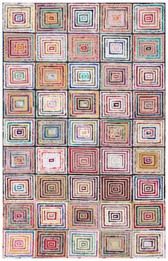 a multicolored rug with squares and rectangles