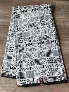 DESCRIPTION African Ankara Fabric. This is high quality African print is 100% cotton and it's 45 inches wide. It is used for making African Clothing, African quilts, & For Home decoration. FYI: Print is Double sided. The listing is for 3yards and 6yards  Each piece of fabric measures: 105 - 108in by 45in for 3yards Traditional White Cotton Digital Prints, White Cotton Fabric With Batik Print, Cotton Fabric With Abstract Pattern, Cotton Fabric With Graphic Print, Black Printed Cotton Patterns, Patterned Cotton Fabric With Graphic Print, White Cotton Fabric With Traditional Patterns, Printed Ankara Fabric In White, Printed White Ankara Fabric