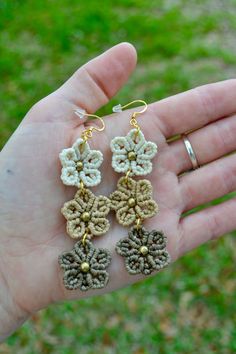 ✺✳ Macrame Stacked Flower Earrings ✳✺ Springtime but make it an earring. These are boho chic to the nines. This pair of earrings is made with string colors 'cream', 'camel', and 'dirt.' * Product Details * Triple stacked macrame flowers with hypoallergenic hooks! ★ Brass Earth ★ This jewelry is handmade by myself and inspired by my time living in India. All materials are sourced from the friend who taught me this craft 8 years ago! Each piece is woven with intention and love. Handmade Beige Flower-shaped Earrings, Handmade Beige Flower Earrings As Gift, Handmade Beige Flower Earrings For Gift, Handmade Cream Flower Earrings For Gift, Macrame Flowers, Earrings Macrame, Beach Flowers, Jewelry Beach, Hippie Earrings