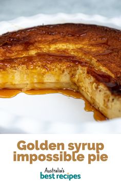 a piece of food on a plate with the words golden syrup impossible pie