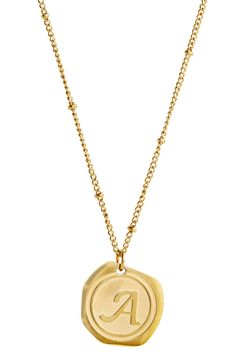 A 22 karat gold plated stainless steel chain necklace with an initial pendant offers a simple, refined style. 22K gold plated stainless steel initial coin pendant necklace. Lobster clasp closure. Approx. 16" chain length with 2" extension. Imported Initial Pendant Coin Necklace With Adjustable Chain, Gold Coin Necklace With Initial Pendant And Adjustable Chain, Gold Initial Necklace With Cable Chain, Stainless Steel Chain Necklace, Coin Pendant Necklace, Initial Necklace Gold, Refined Style, Initial Pendant, Coin Necklace