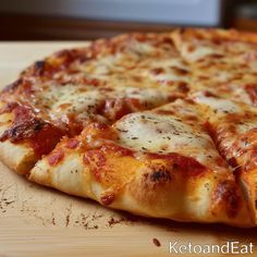 a pizza sitting on top of a wooden cutting board