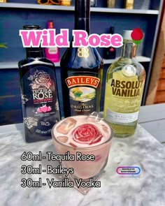 an advertisement for wild rose vodka on the counter