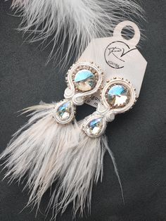 My handmade sutage technique earrings feature natural feathers and glass crystal beads, creating a unique and elegant look.  Not only are they visually stunning, but they are also lightweight and comfortable to wear, making them a perfect accessory for any occasion. Earring Crafts, Handmade Earrings, Earrings Handmade, Jewelry Earrings Studs, Crystal Beads, Jewelry Earrings, Stud Earrings, Gift Card, Etsy Accessories