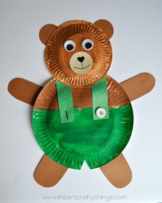 a paper plate with a teddy bear on it