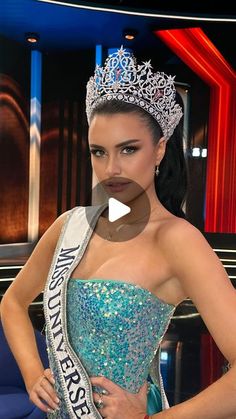 a woman wearing a tiara standing in front of a tv screen with the words miss tennessee on it