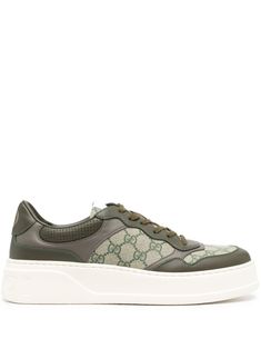 green/beige calf leather canvas panelled design GG Supreme canvas round toe logo patch at the tongue branded heel counter signature Interlocking G logo padded ankle branded leather insole logo at the sole contrasting flat rubber sole front lace-up fastening This piece comes complete with a protective dust bag. Modern Green Sneakers With Textured Sole, Luxury Green Sneakers For Streetwear, Luxury Green Sneakers With Branded Insole, Luxury Green Low-top Sneakers, Green Leather High-top Platform Sneakers, Green High-top Leather Platform Sneakers, Gucci Leather Low-top Platform Sneakers, Calf Leather Sneakers With Logo And Round Toe, Green Leather Low-top Platform Sneakers