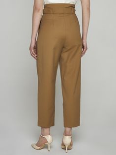 Max Mara's Verna paper-bag trousers in tobacco-tone cotton and nylon blend featuring high pleated waist, golden eyelets with matching self-tie belt, side pockets and straight loose leg. Composition: 87% cotton 13% nylon Brown Tapered Leg Pants With Button Closure, Non-stretch Yellow Trousers, Max Mara Trousers, Max Mara Coat, Max Mara 101801 Coat, Wang Dress, Versace Shirt, Versace Sweatshirt, Expensive Handbags