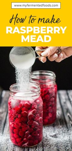 raspberry mead being poured into a mason jar with the words how to make raspberry mead