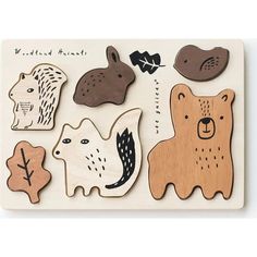 a wooden puzzle with different animals on it