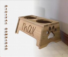 a wooden step stool with the word max written on it and holes in the bottom