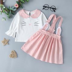 Baby Girls Cute Lapel Cat Print Tops & Suspender Skirt - PrettyKid Cute School Sets For Spring, Cute Spring School Sets, Cute Skirt For Spring Playtime, Cute Spring Skirt For Playtime, Cute Spring Playtime Skirt, Cute Pink Skirt For Playtime, Cute Fitted School Set, Long Black Skirts, Fancy Fabric