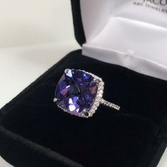 Beautiful Alexandrite & White Sapphire Ring  * 8ct Cushion Cut Alexandrite measures 12mm * White Sapphire Accents * Solid 925 Sterling Silver with an Anti-Tarnish Rhodium Finish * Sized to Order - Select Your Size Hallmarked & Gift Ready! Matching Earrings available here https://www.etsy.com/listing/454248468/gorgeous-10ct-cushion-cut-color-change?ref=shop_home_feat_2 Matching Pendant also Available! This Alexandrite is Laboratory Grown.  The color changes in this stone range from deep purple to Classic Cushion Cut Brilliant Gemstones, Formal Sapphire Ring With Cushion Cut And Prong Setting, White Gold Gemstones With Halo Setting For Formal Events, Formal Cushion Cut Sapphire Ring With Prong Setting, Formal White Gold Gemstones With Halo Setting, Cushion Cut Diamond Gemstones For Fine Jewelry, Formal Tanzanite Round Cut Diamond Ring, Formal Tanzanite Diamond Ring With Round Cut, Cushion Cut Diamond Fine Jewelry